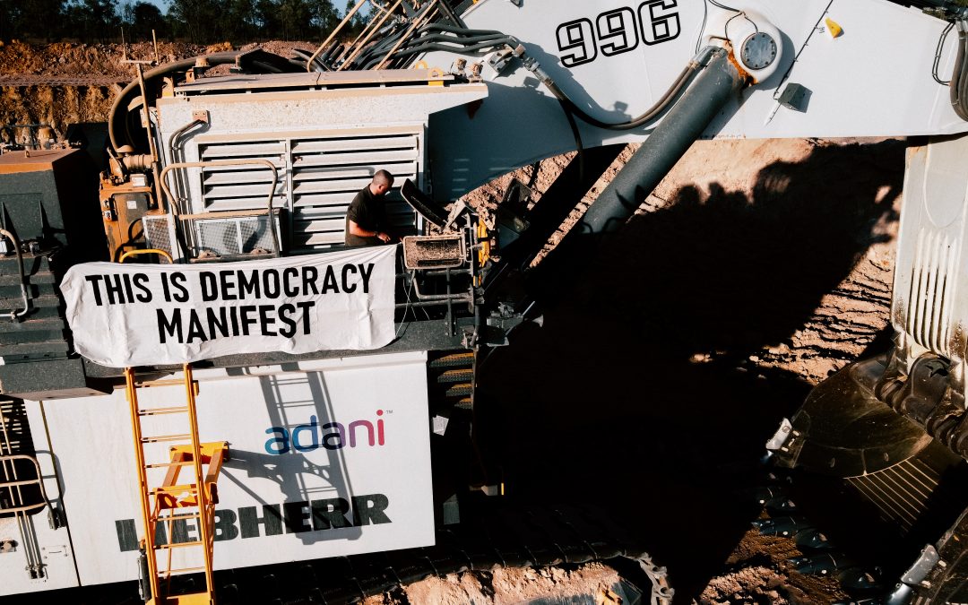 Work disrupted on Adani’s mine site – “this is democracy” say activists