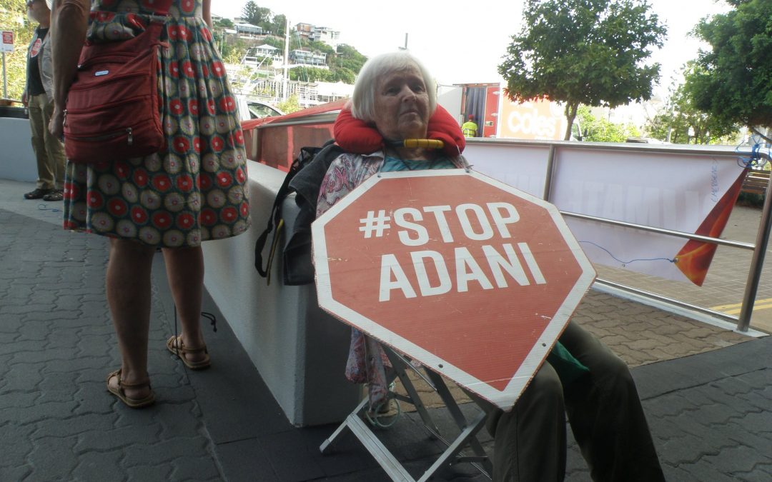 Adani HQ disrupted as 75 year old ‘locks on’